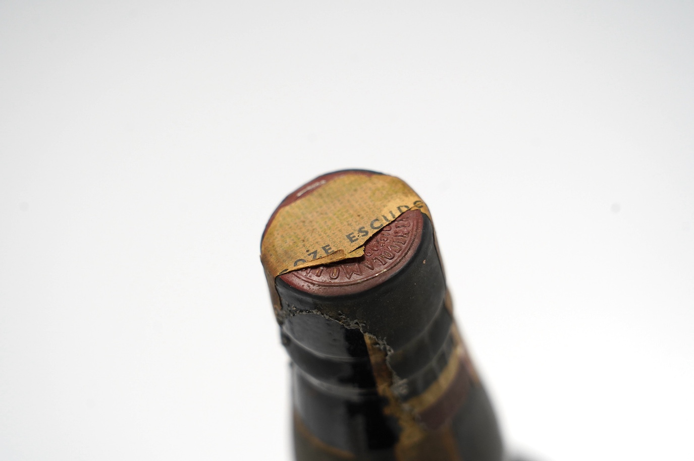 A bottle of 1927 Garrafeira port. Condition - sealed, some damage to labels, but contents unknown